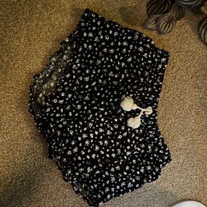 7/8 M black base and white floral skort with white tied knot